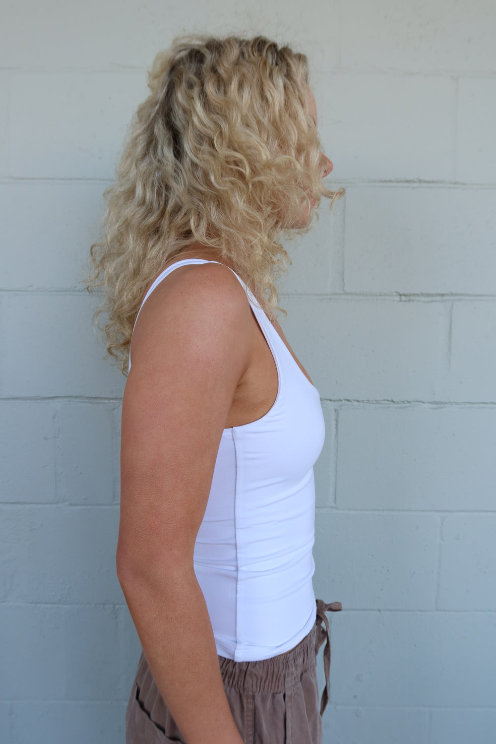 NUD Apparel Devon Long Tank In White Side Detail.