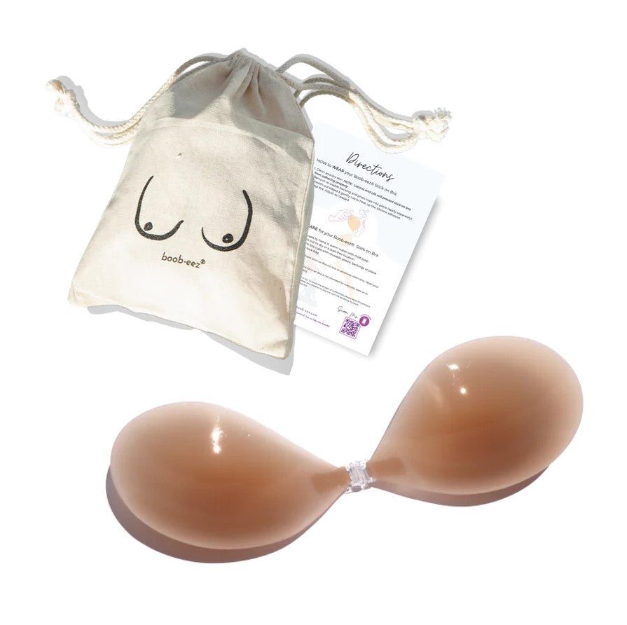 Product shot of Boob-eez Medium Tint Silicone Stick On Bra with canvas bag.
