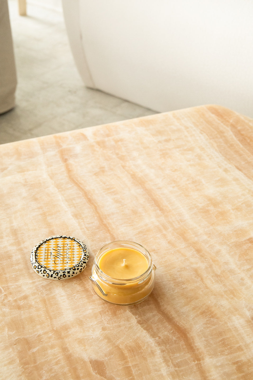 Product shot of Tyler Candle Company 3.4oz candle in scent icon.