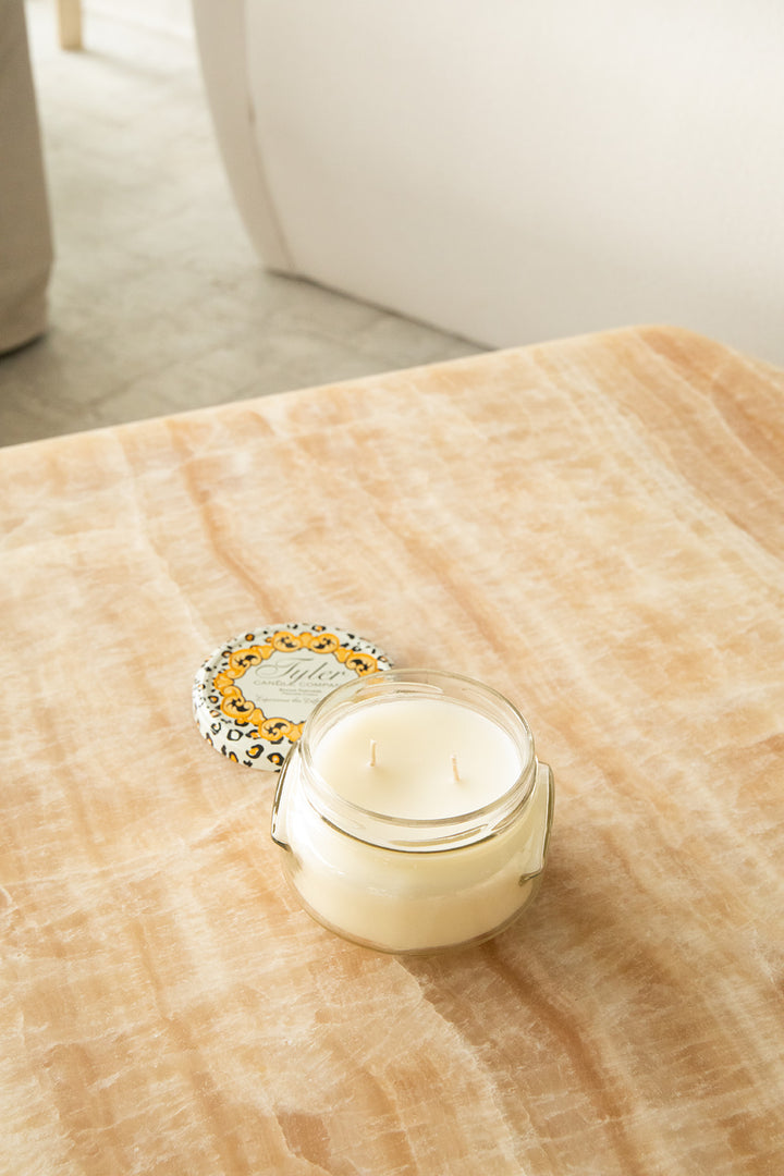 Product shot of Tyler Candle Company 11oz candle in scent platinum.