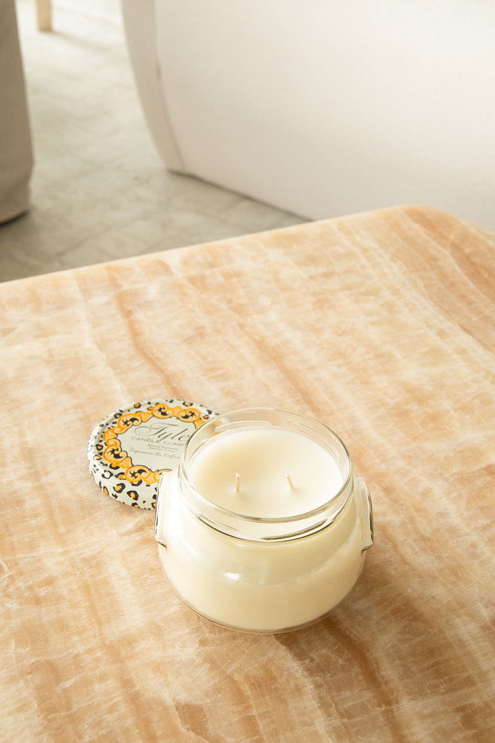 Product shot of Tyler Candle Company 22oz candle in scent platinum.