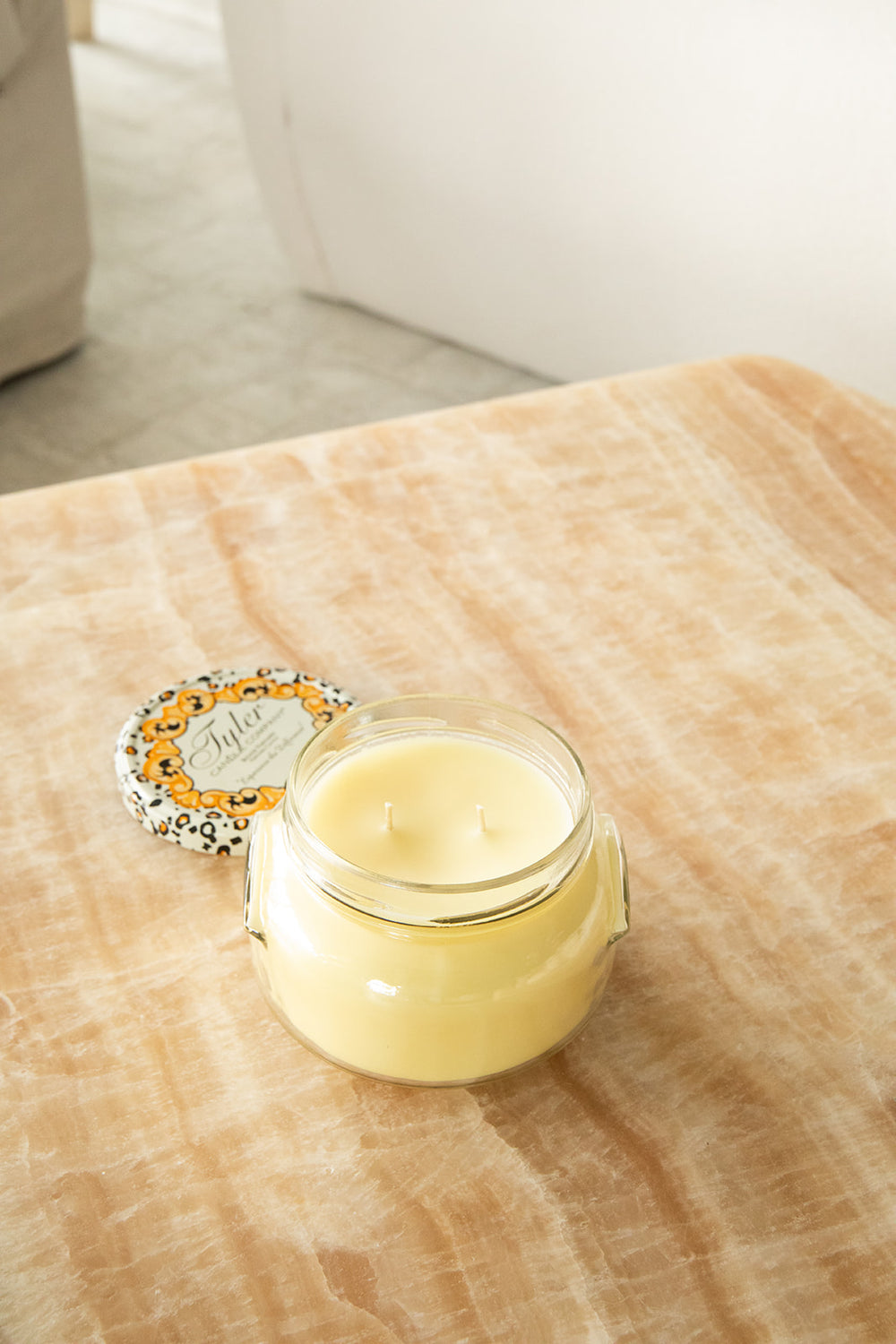 Product shot of Tyler Candle Company candle in 22oz size in scent beach blonde.