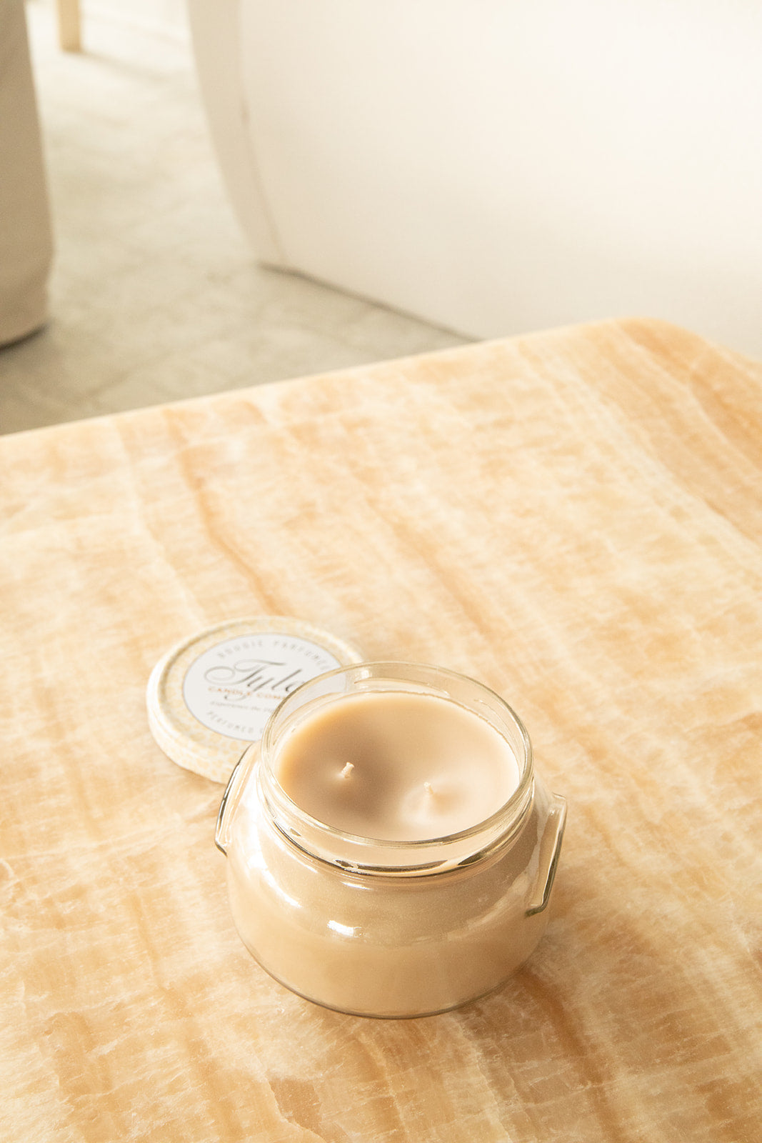 Product shot of Tyler Candle Company candle 22oz size in scent celebrity.