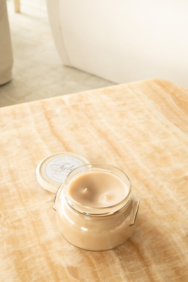 Product shot of Tyler Candle Company candle 22oz size in scent celebrity.