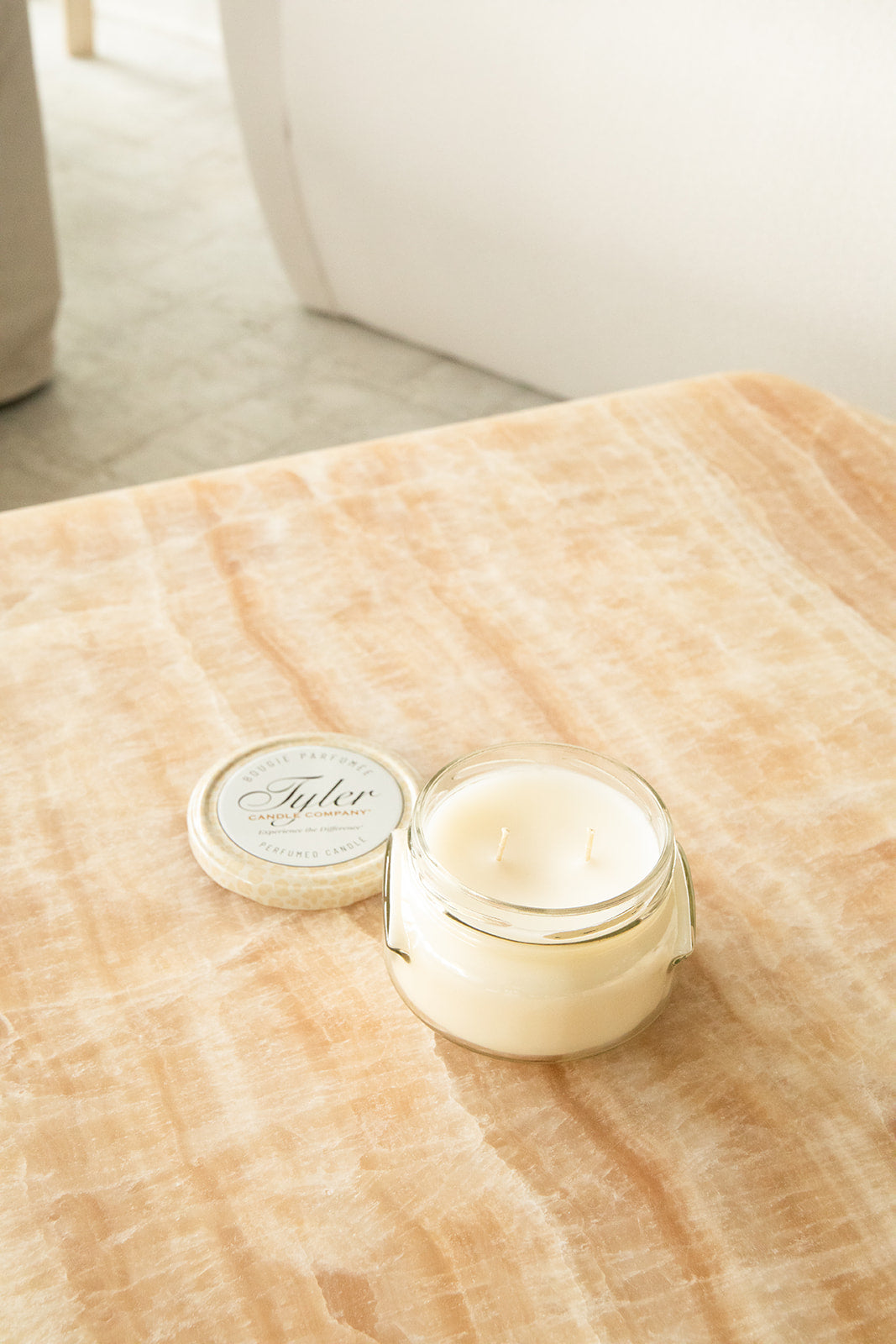 Product shot of Tyler Candle Company candle in 11oz size in scent diva.
