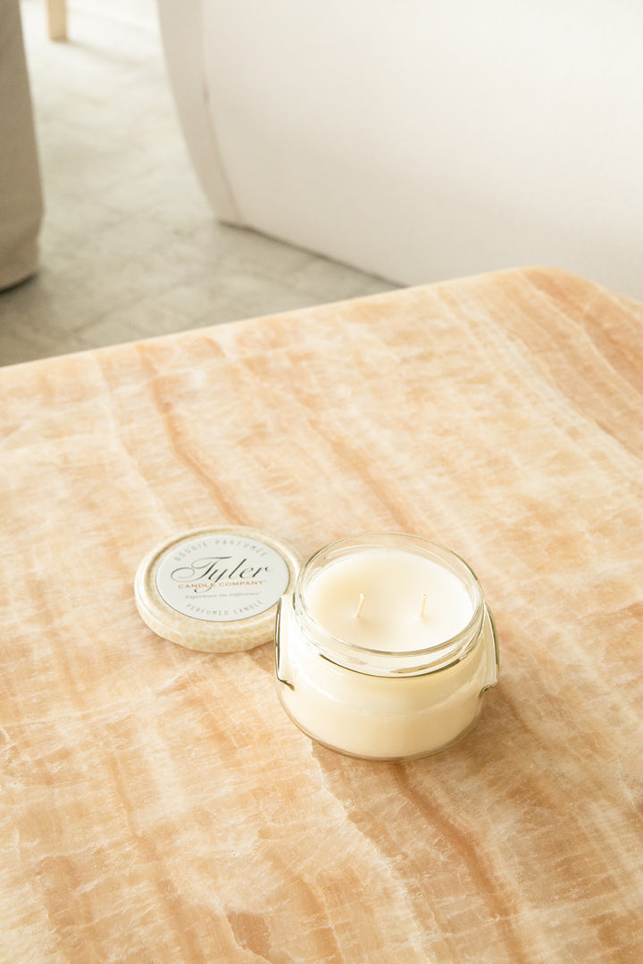 Product shot of Tyler Candle Company candle in 11oz size in scent diva.