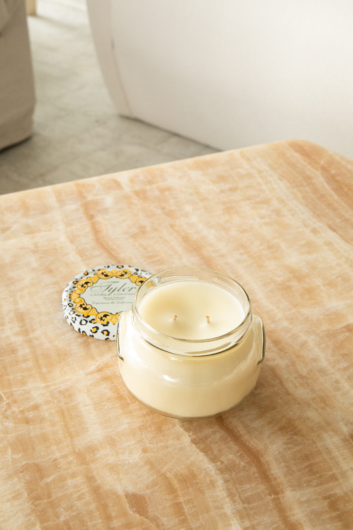Product shot of Tyler Candle Company candle in 22oz size in scent dolce vita.