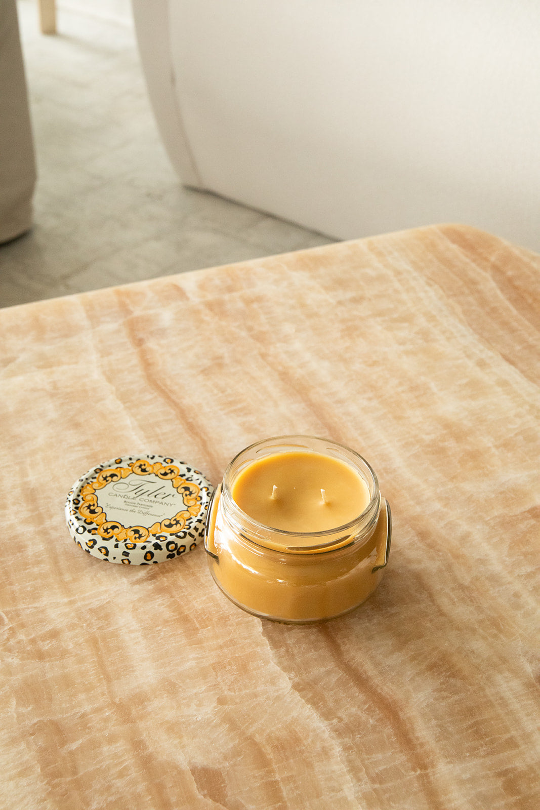 Product shot of Tyler Candle Company 11oz candle in scent family tradition.