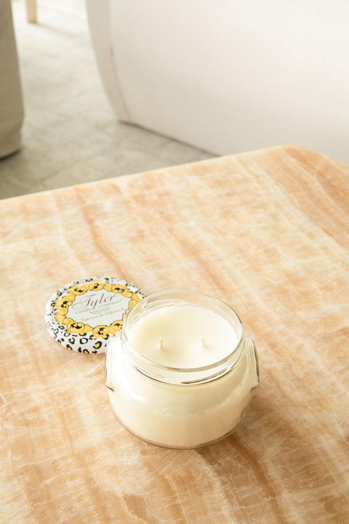 Product shot of Tyler Candle Company 22oz candle in scent french market.