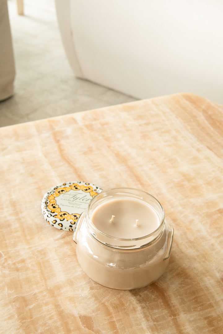 Product shot of Tyler Candle Company 22oz candle in scent high maintenance.