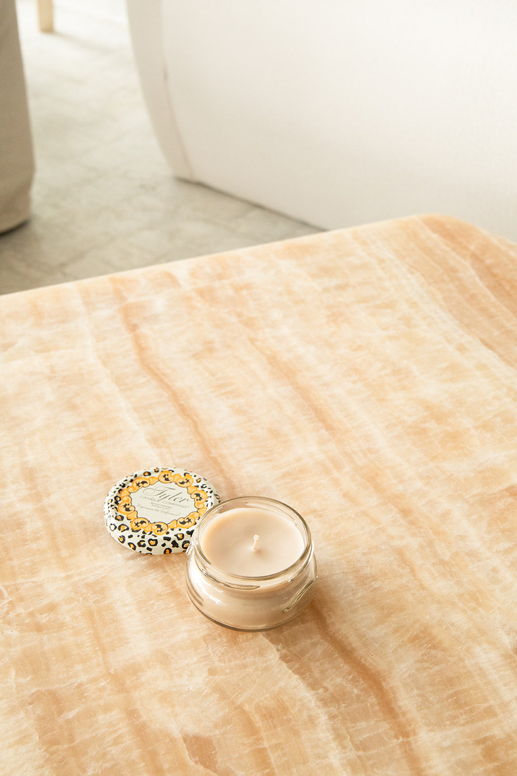 Product shot of Tyler Candle Company 3.4oz candle in scent high maintenance.