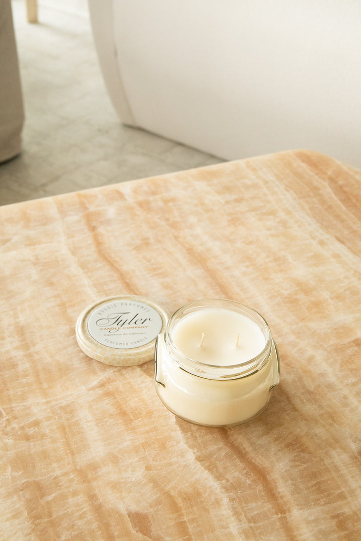 Product shot of Tyler Candle Company 11oz candle in scent regal.