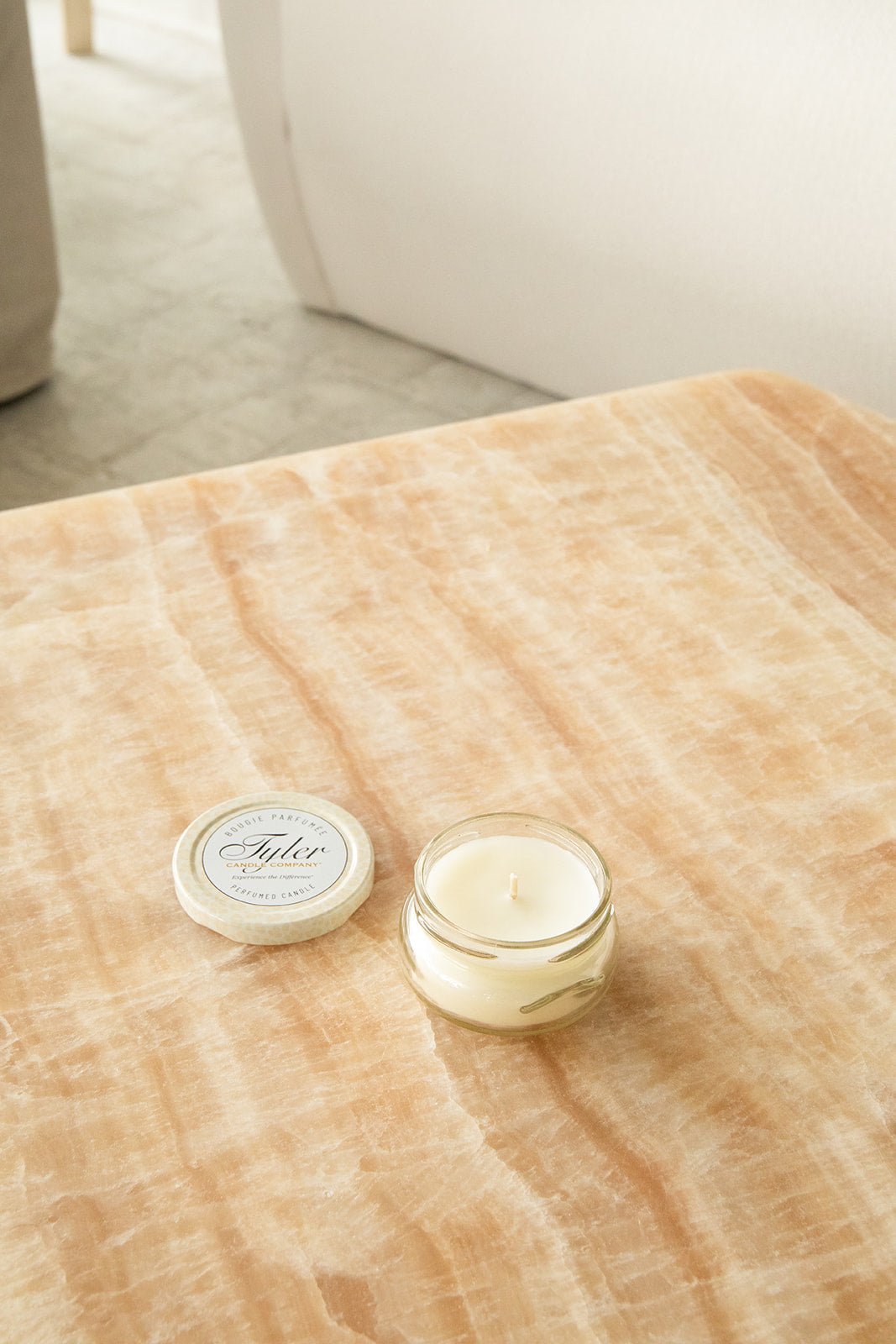 Product shot of Tyler Candle Company 3.4oz candle in scent regal.