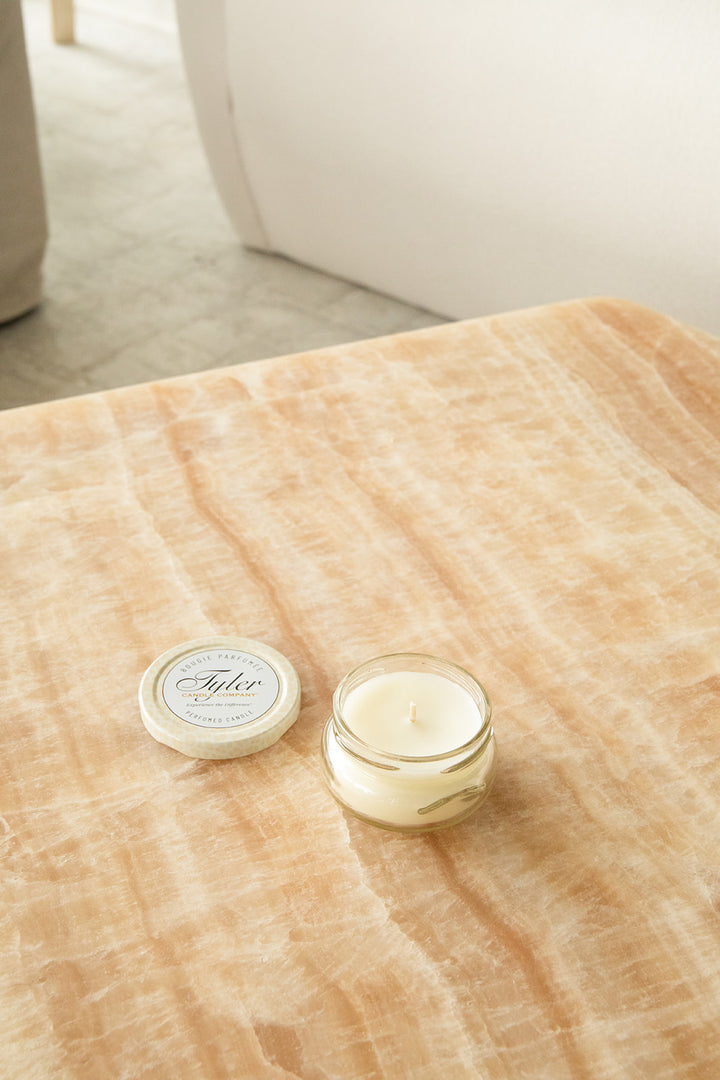 Product shot of Tyler Candle Company 3.4oz candle in scent regal.
