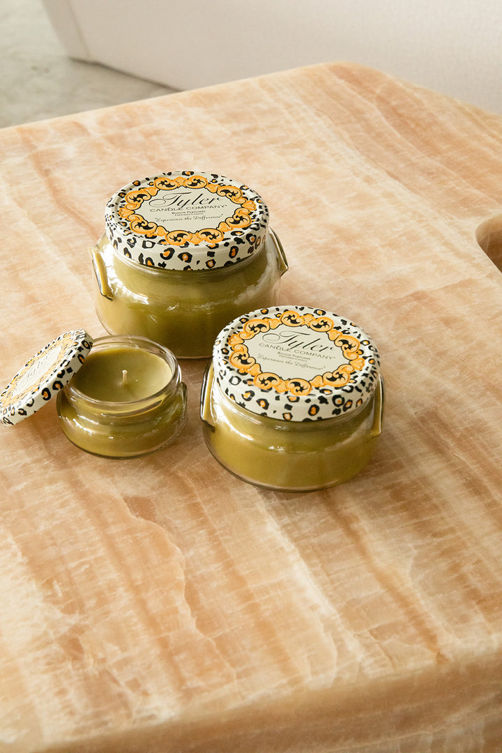 Product shot of Tyler Candle Company candles in 22oz, 11oz, and 3.4oz in scent tyler.