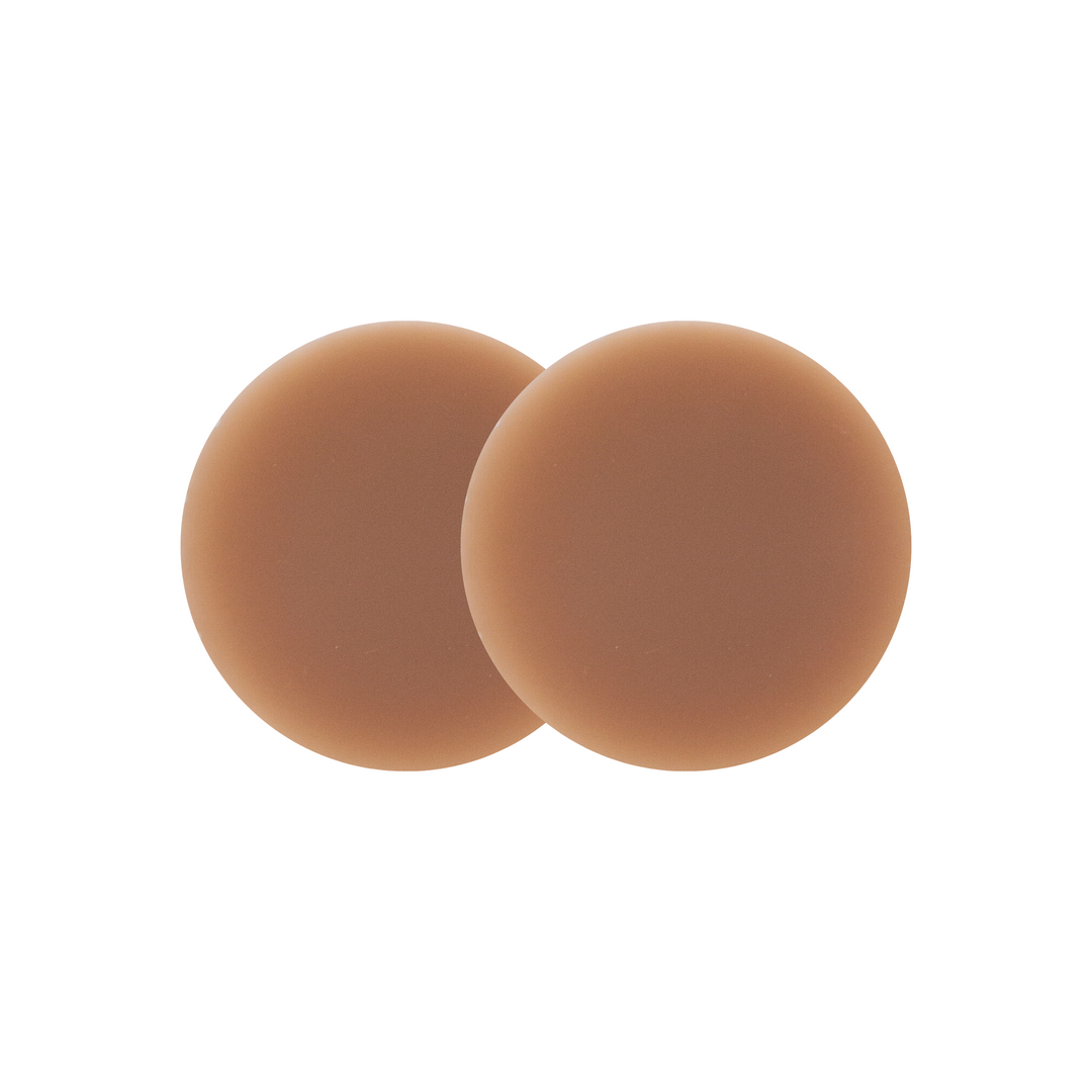Detail shot of Boob-eez 6cm dark tint nipple covers.