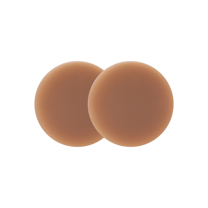 Detail shot of Boob-eez 6cm dark tint nipple covers.