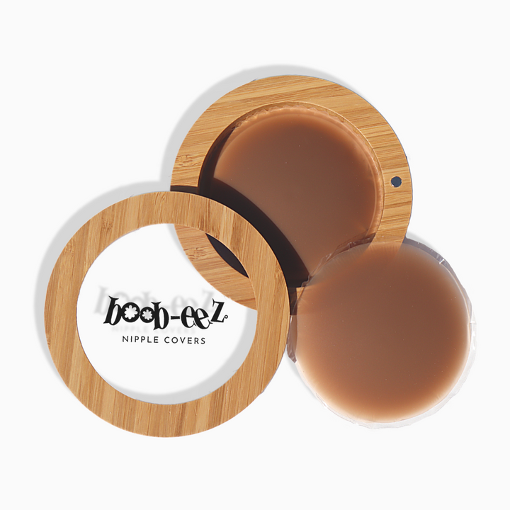 Product shot of Boob-eez LUXE Combo - Dark Tint 8cm Nipple Covers + Carrying Case.