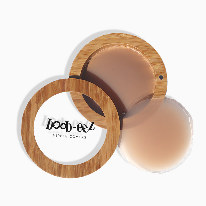 Product shot of Boob-eez LUXE Combo - Medium Tint 8cm Nipple Covers + Carrying Case.