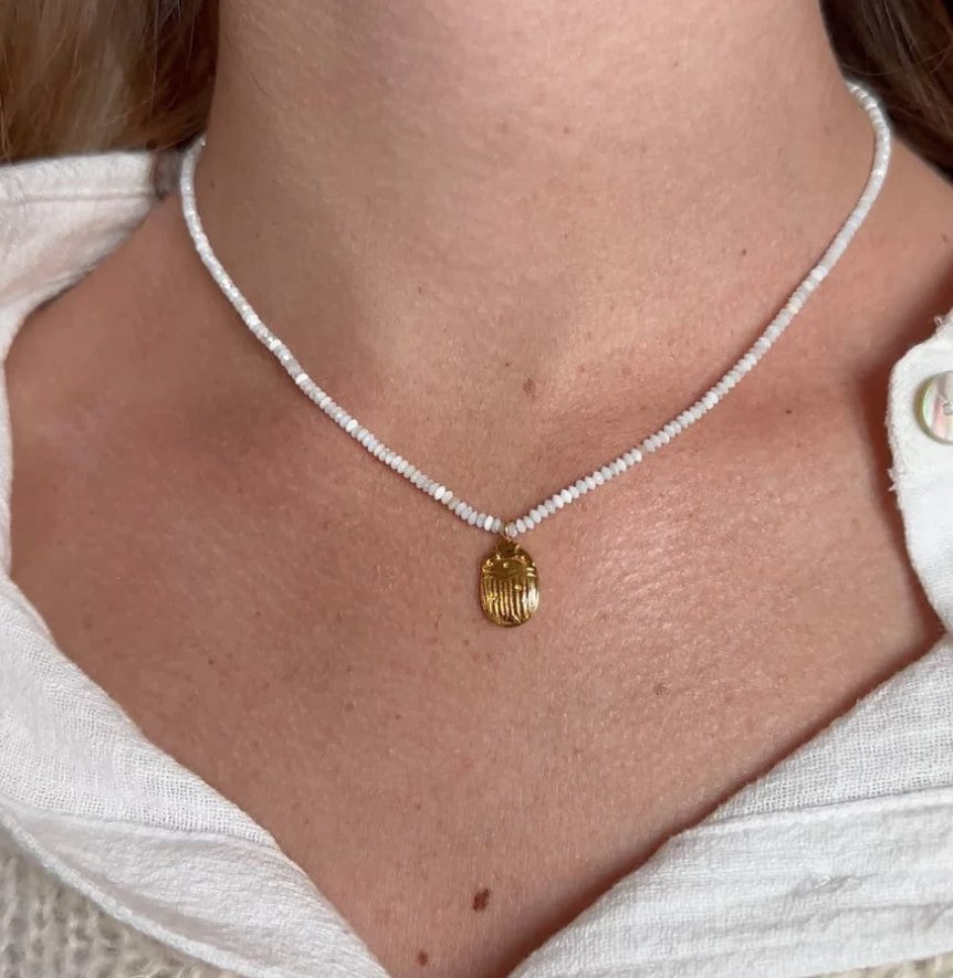 
                  
                    Gold Beetle Necklace
                  
                