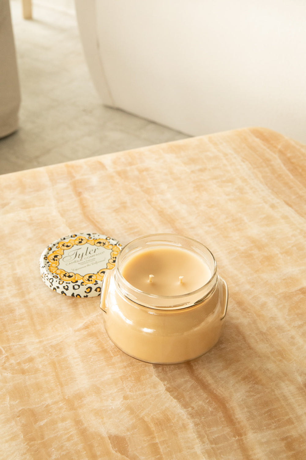 Product shot of Tyler Candle Company 22oz candle in scent icon.