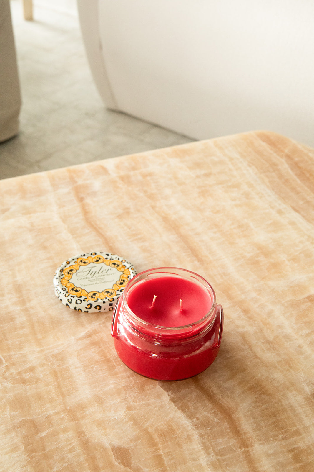 Product shot of Tyler Candle Company candle in 11oz size in scent christmas tradition. 