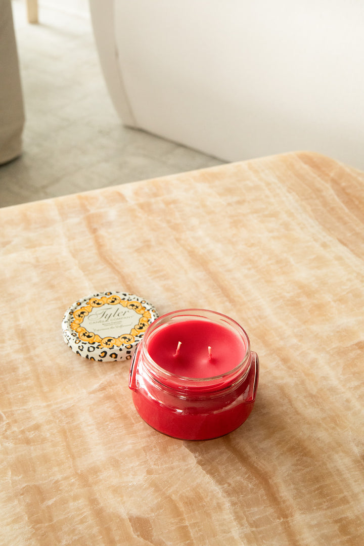 Product shot of Tyler Candle Company candle in 11oz size in scent christmas tradition. 