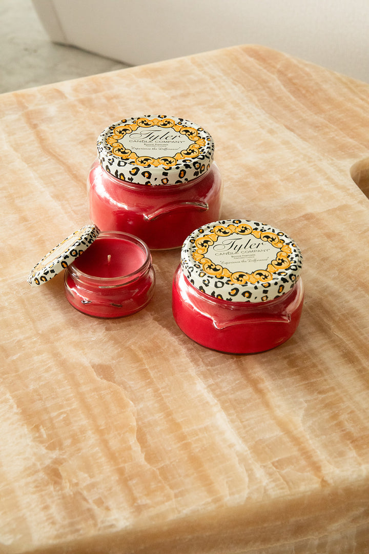 Product shot of Tyler Candle Company candles in 22oz, 11oz, and 3.4oz in scent christmas tradition. 
