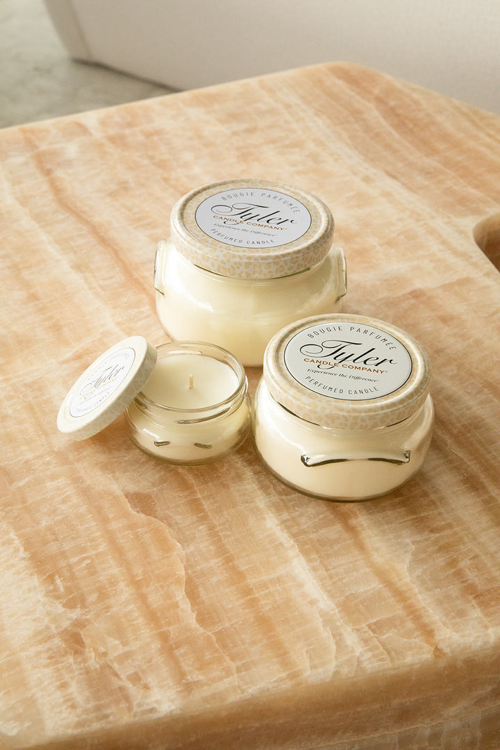 Product shot of Tyler Candle Company candles in 22oz, 11oz, and 3.4oz in scent diva. 