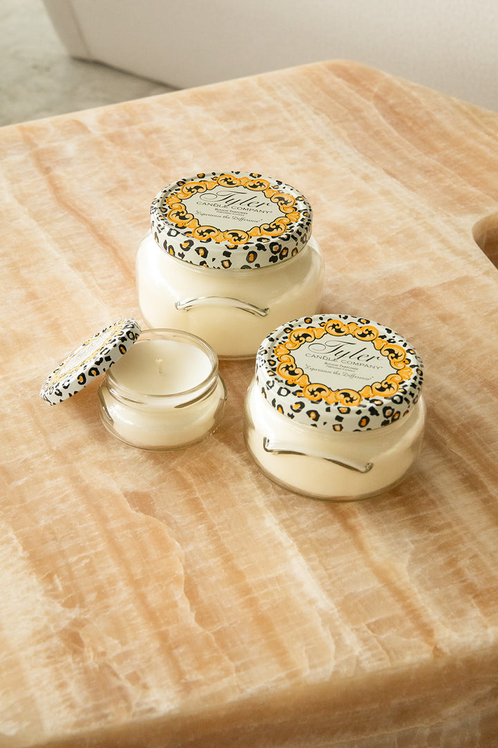 Product shot of Tyler Candle Company candles in 22oz, 11oz, and 3.4oz in scent entitled.