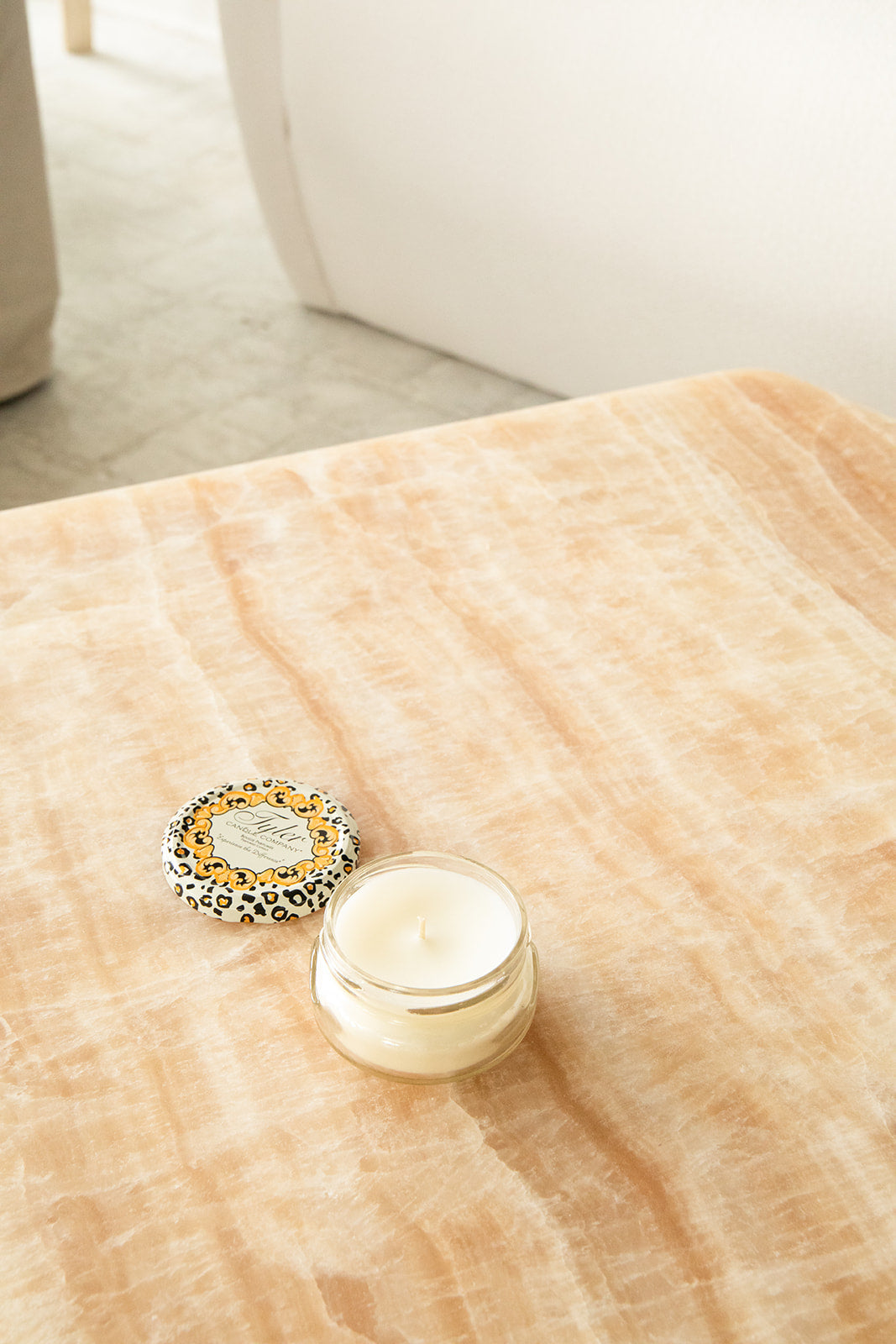 Product shot of Tyler Candle Company 3.4oz candle in scent french market.
