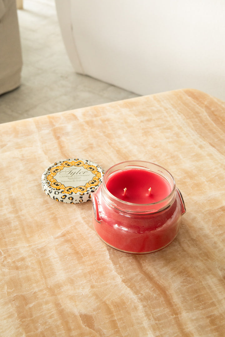 Product shot of Tyler Candle Company 22oz candle in scent kathina.
