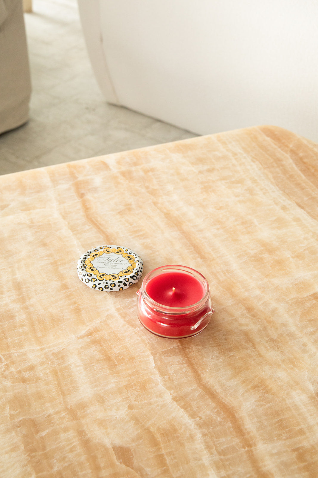 Product shot of Tyler Candle Company 3.4oz candle in scent kathina.