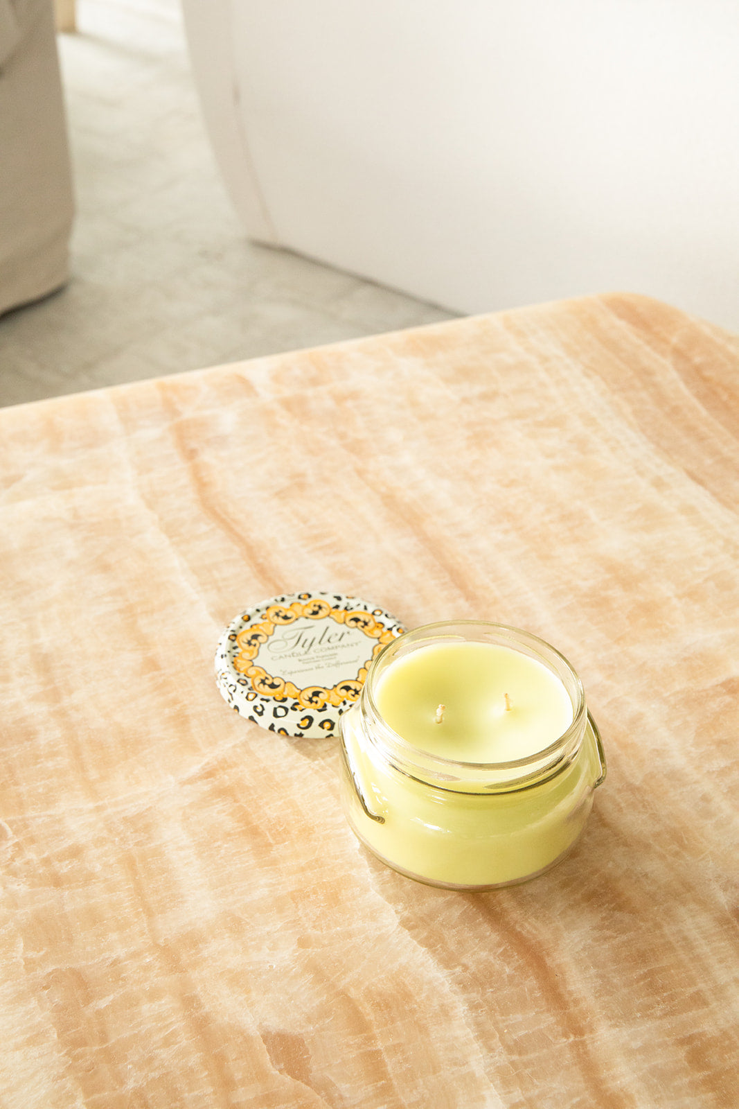 Product shot of Tyler Candle Company 11oz candle in scent limelight.