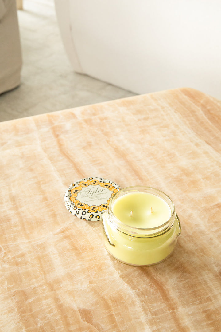 Product shot of Tyler Candle Company 11oz candle in scent limelight.