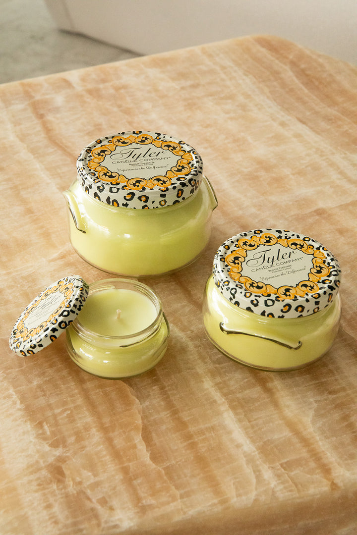 Product shot of Tyler Candle Company candles in 22oz, 11oz, and 3.4oz in scent limelight.