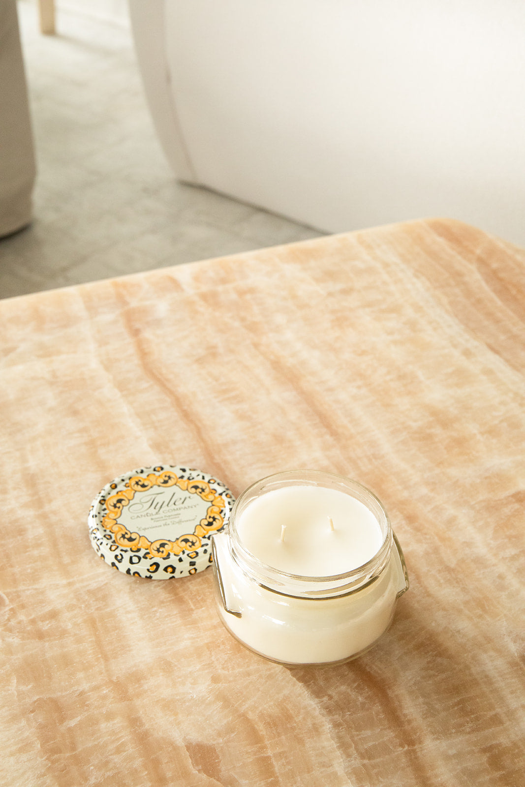 Product shot of Tyler Candle Company 11oz candle in scent wishlist.