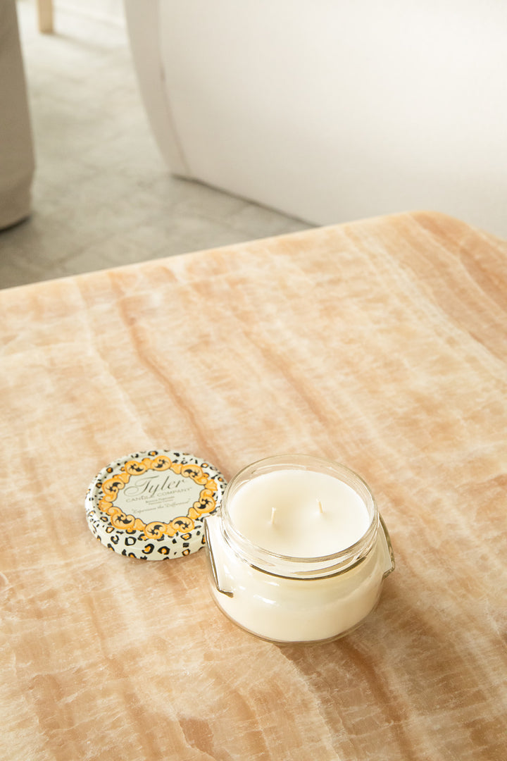 Product shot of Tyler Candle Company 11oz candle in scent wishlist.