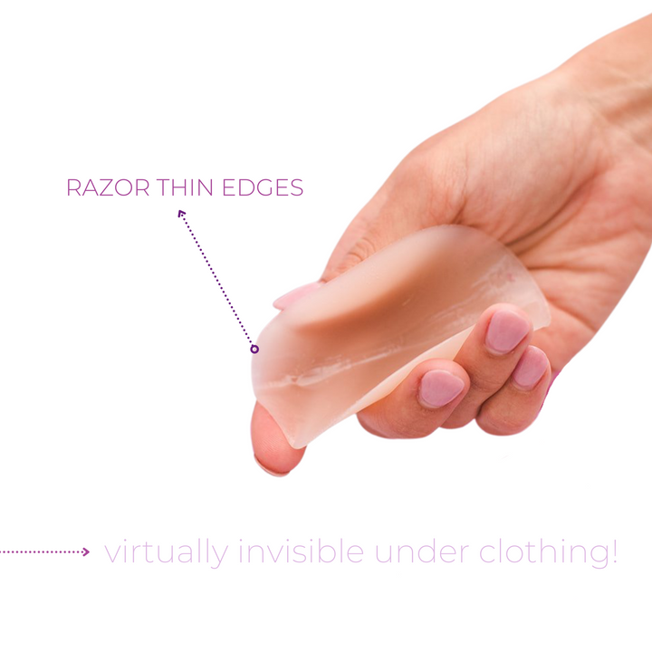 Product shot of Boob-eez 8cm medium tint nipple covers displaying razor thin edges.