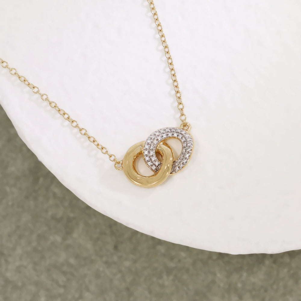 
                  
                    Entwined Discs Necklace
                  
                